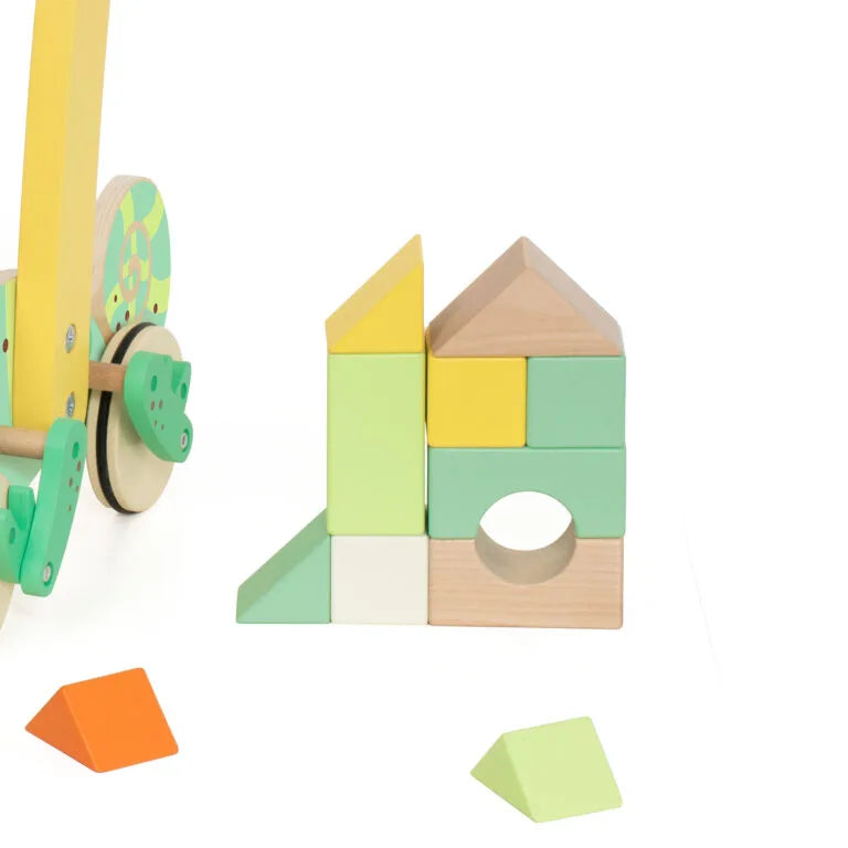 Colorful wooden building blocks with a toy cart on a white background