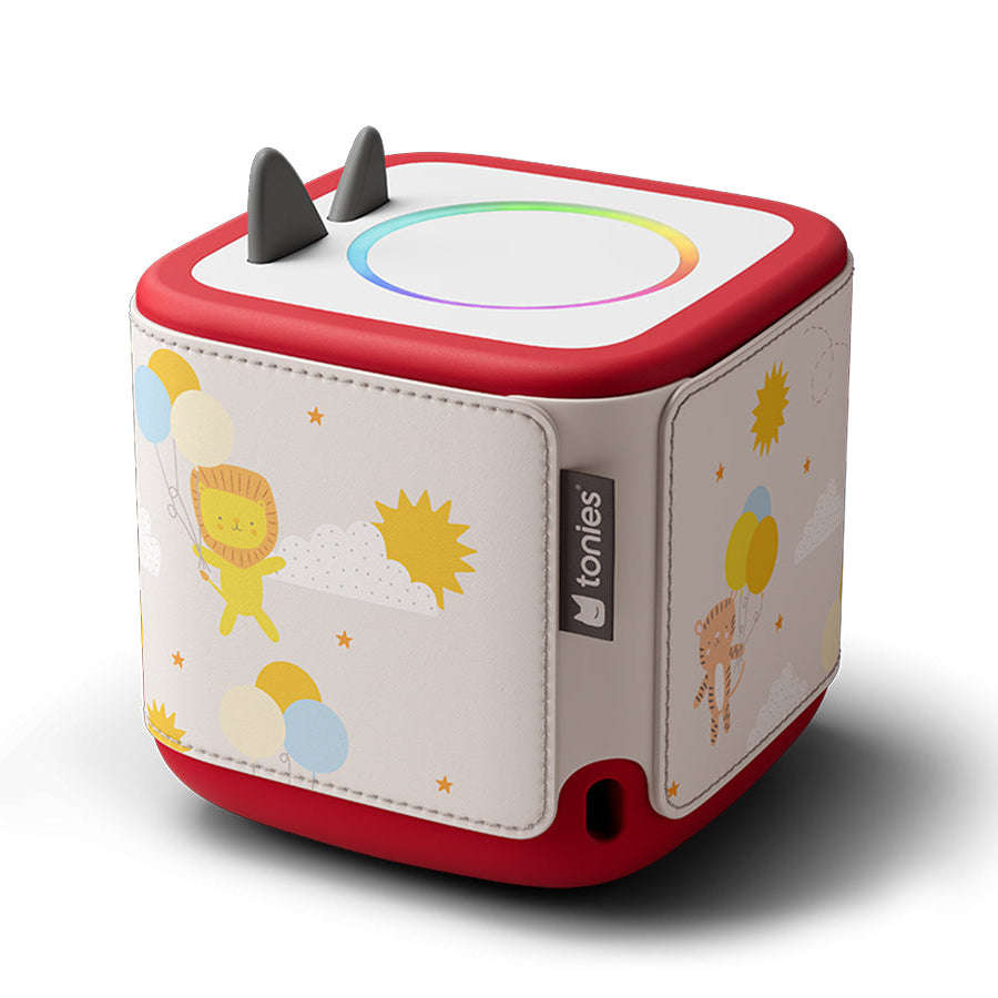 Children's toy cube with colorful designs on a white background
