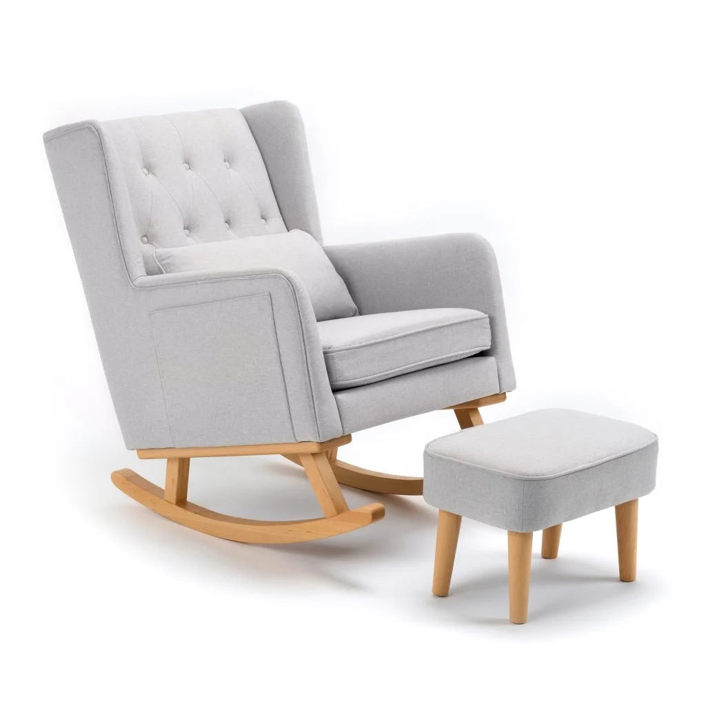 Gray rocking chair with wooden legs and matching ottoman on a white background