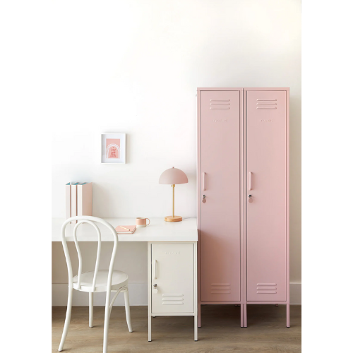 Pink locker next to a white desk with a chair in a room setting.
