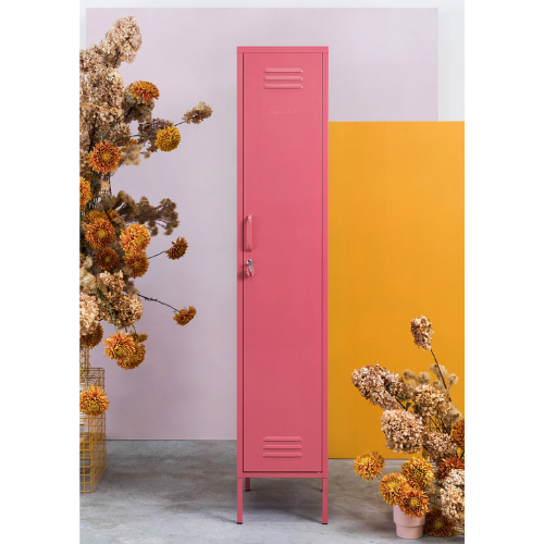 Pink locker with dried flowers on a colorful background