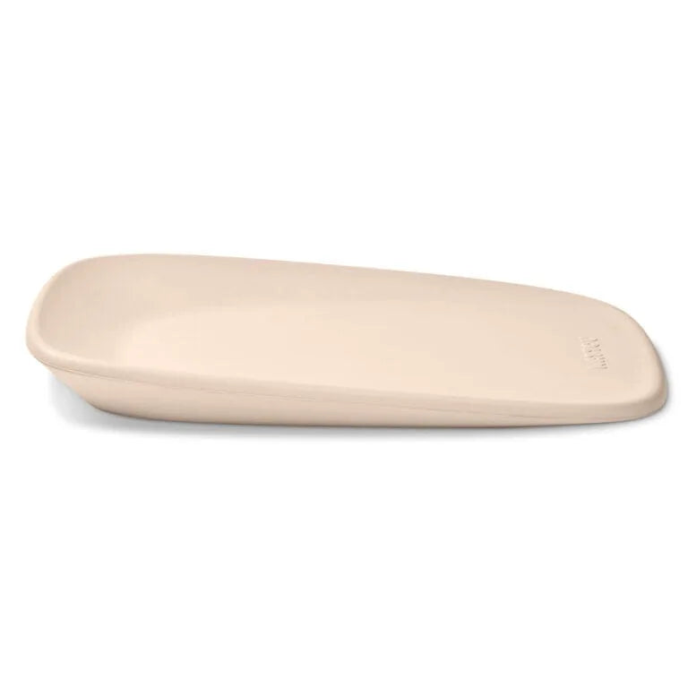 Beige ceramic plate on a white background