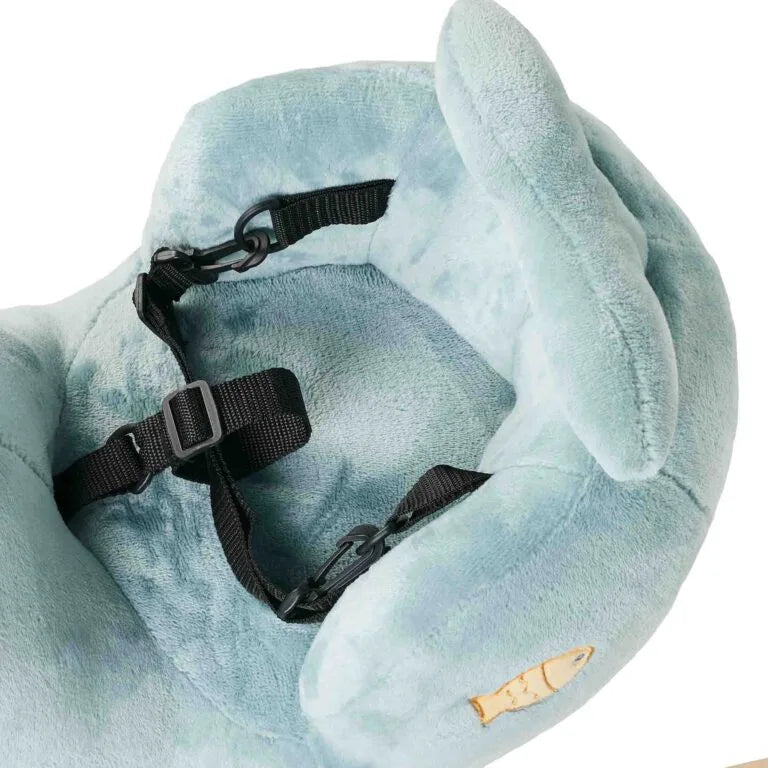 Plush whale-shaped rocking toy on a white background