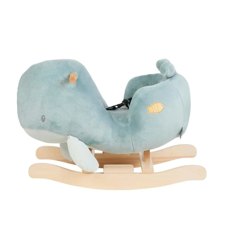 Plush whale-shaped rocking toy on a white background