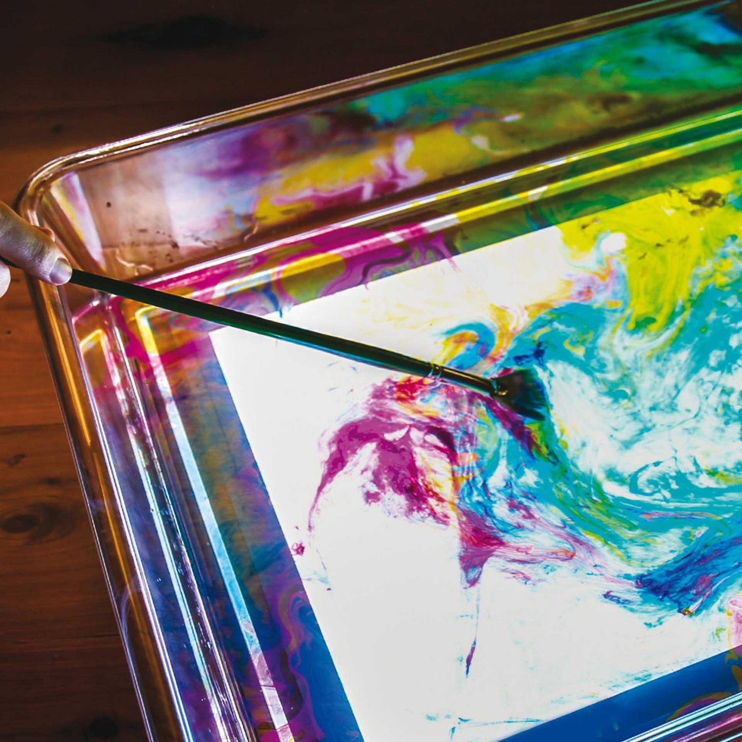 Paint in a tray above a light panel