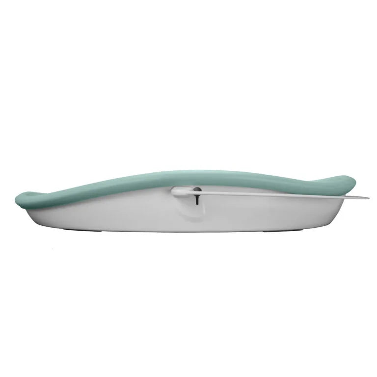 Green changing pad with a hook on a white background