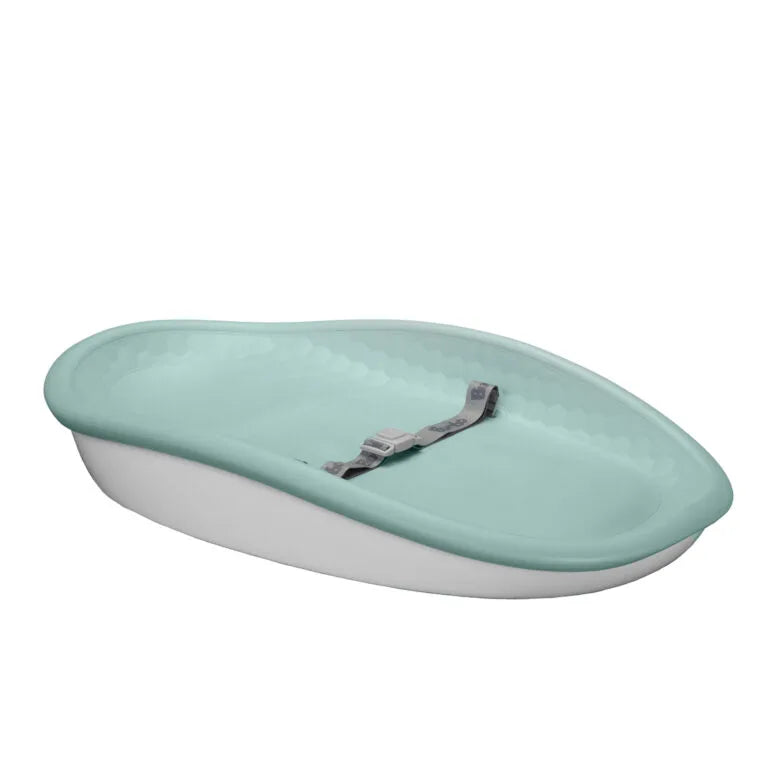 Green changing pad with a hook on a white background