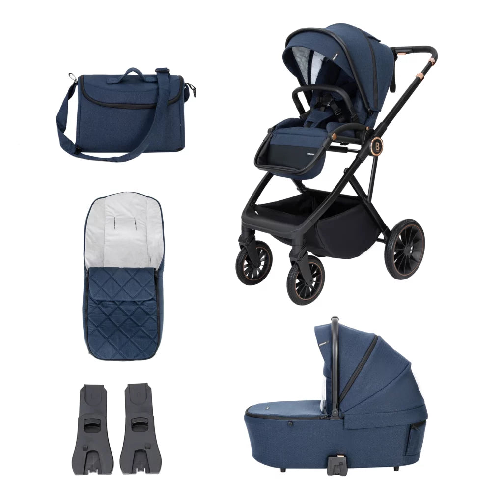 Navy blue stroller set with bag, footmuff, and bassinet on a white background