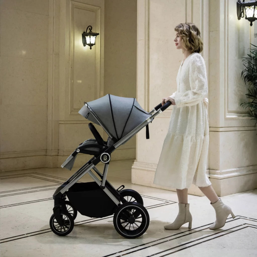 Woman pushing a stroller in an elegant interior setting