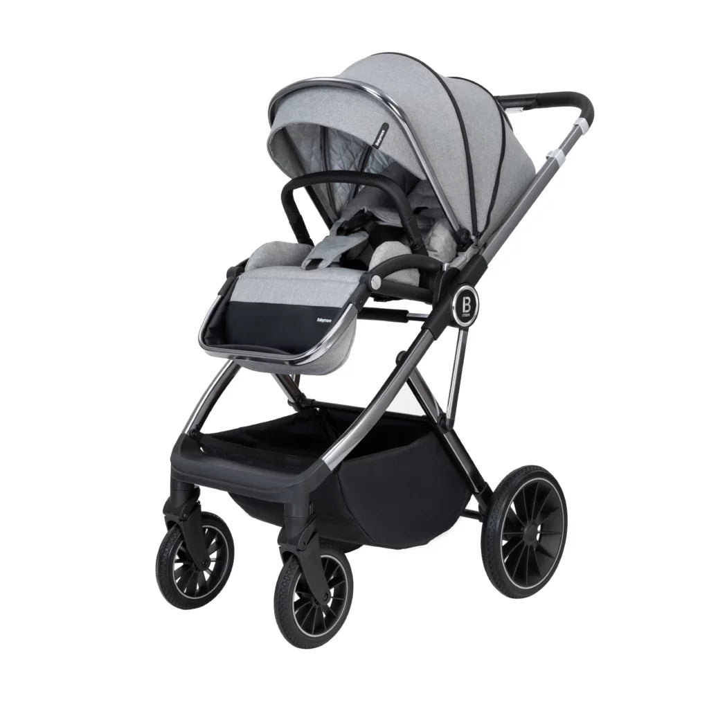 Gray and black stroller on a white background