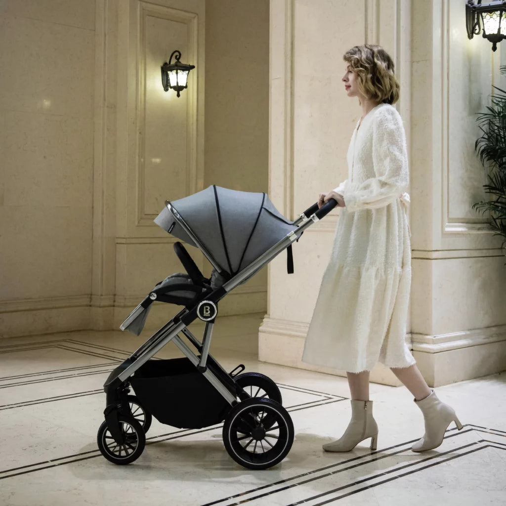 Woman pushing a stroller in an elegant interior setting