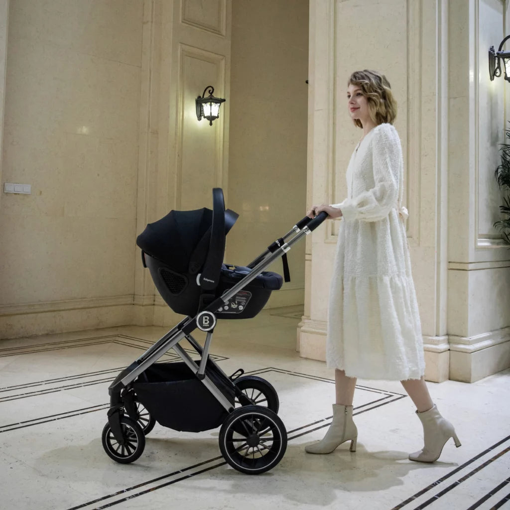 Woman pushing a black stroller in an elegant interior setting