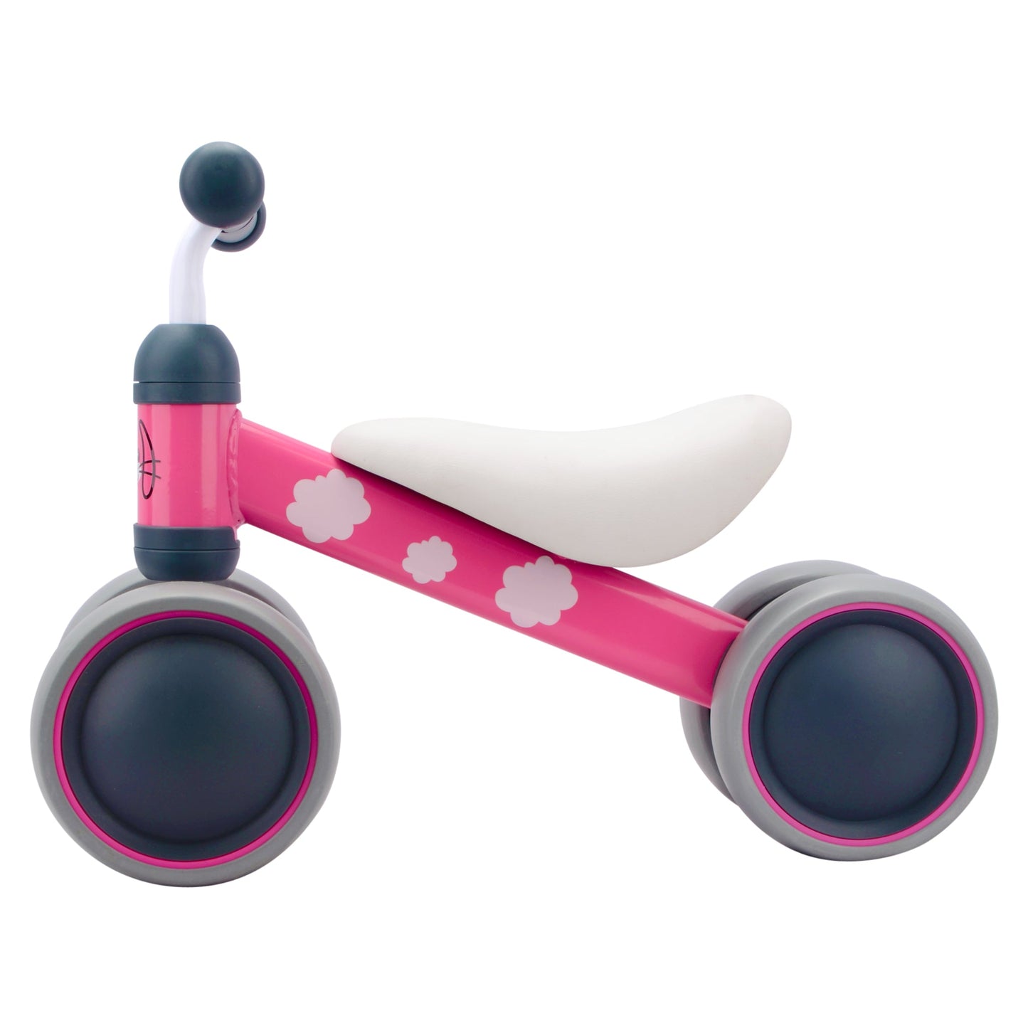 Pink balance bike with white seat and flower patterns on a white background
