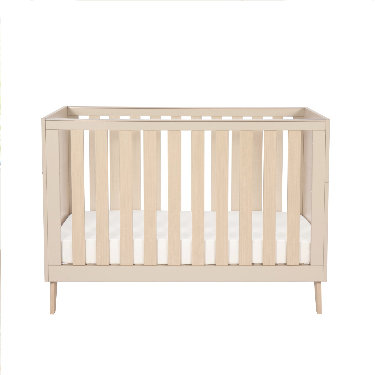 Beige cot with white mattress on a white background
