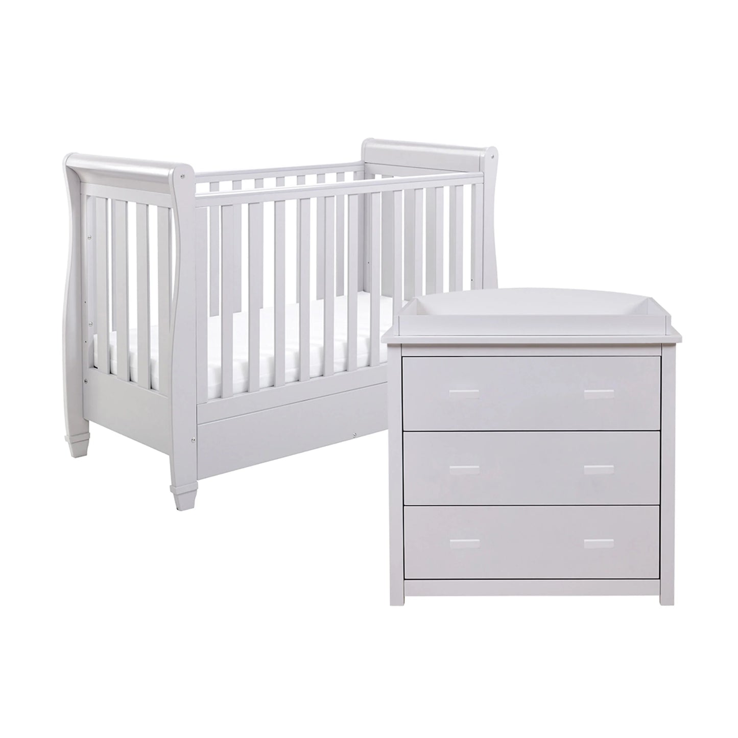 White crib and dresser set on a white background