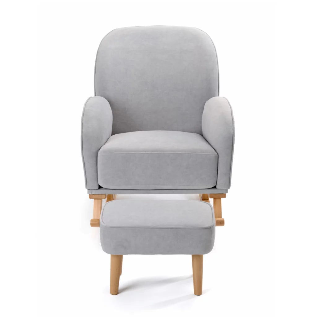 Gray armchair with wooden legs and matching ottoman on a white background