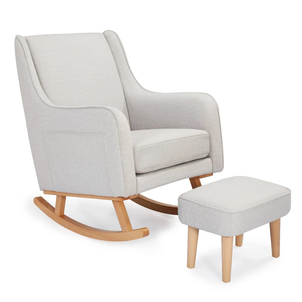 Gray rocking chair with wooden legs and matching ottoman on a white background