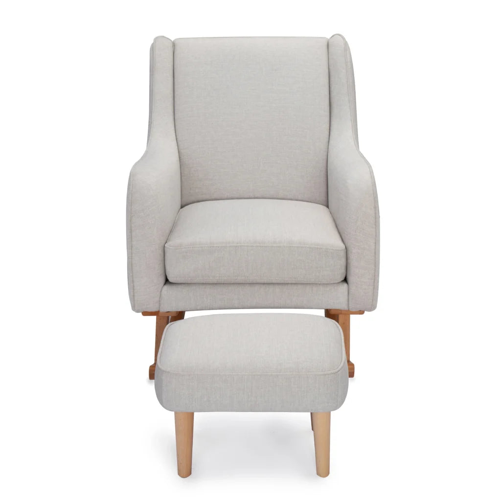 Gray armchair with matching ottoman on a white background