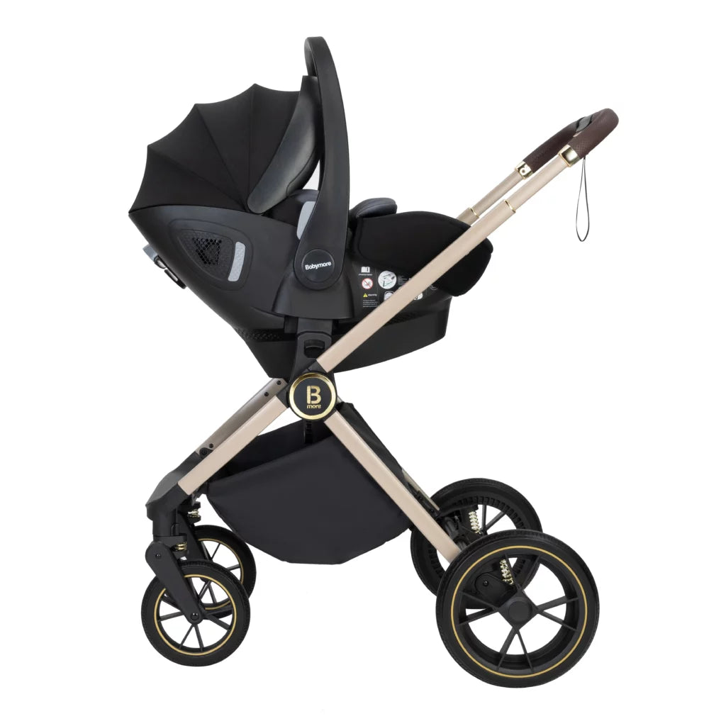 Black and beige stroller with car seat on a white background