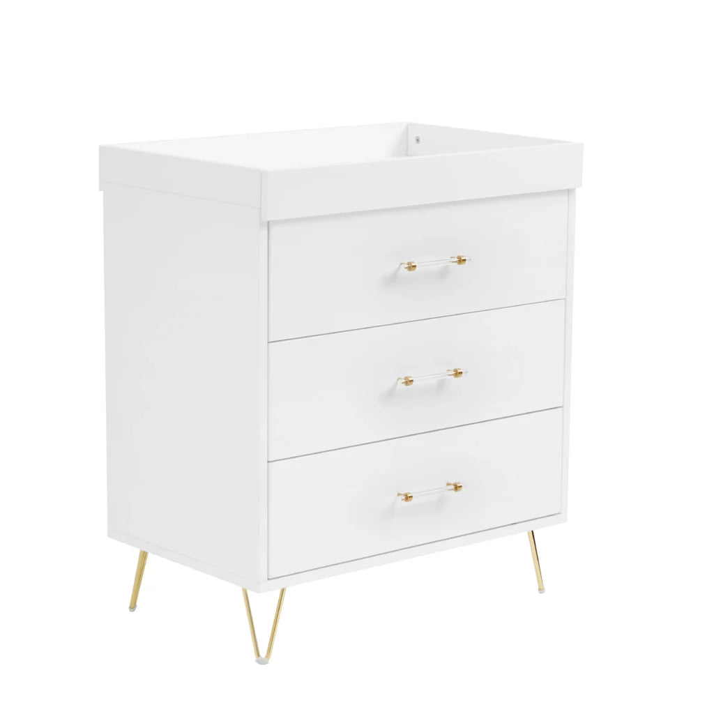 White dresser with gold legs and handles on a white background