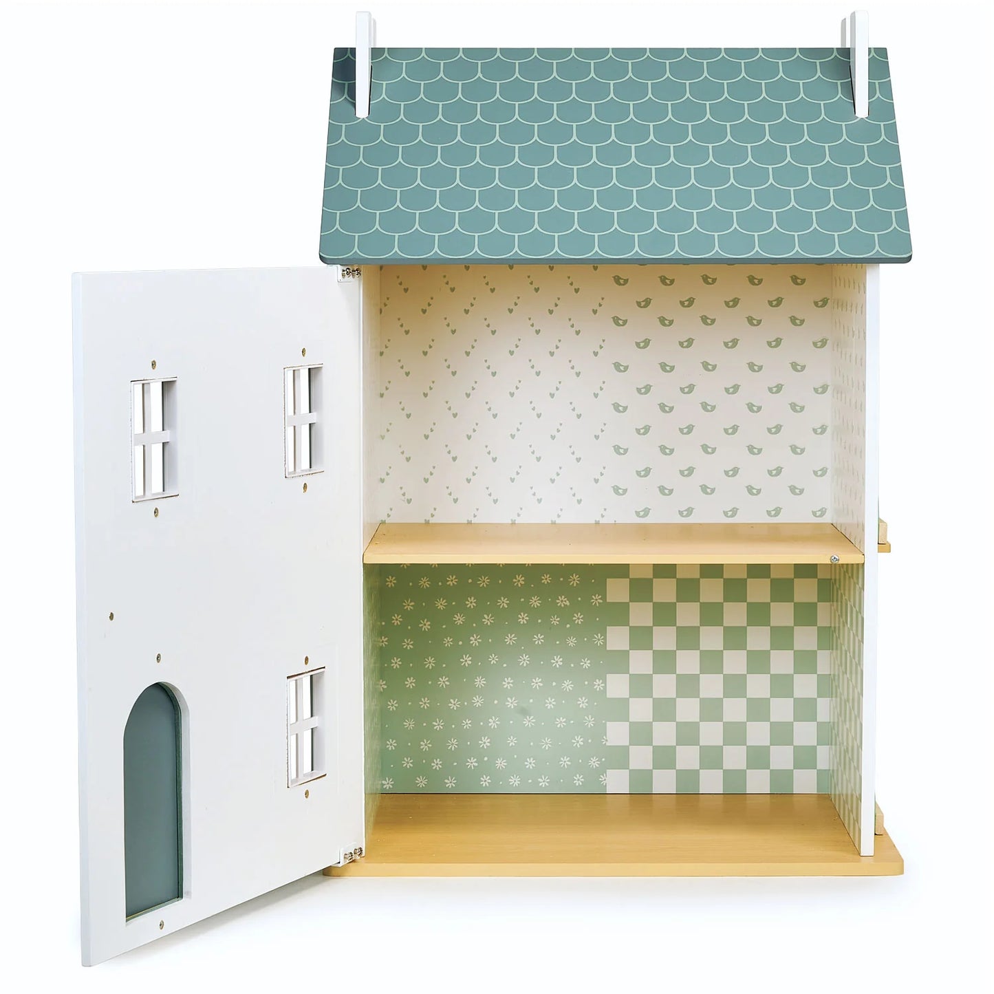 Children's dollhouse with patterned walls and roof on a white background