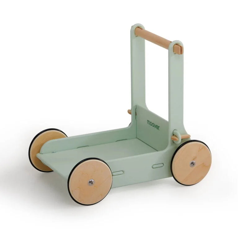 Children's green and beige push cart on a white background