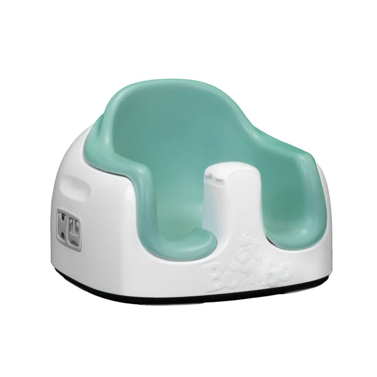 Children's potty seat with teal seat and white base on a white background