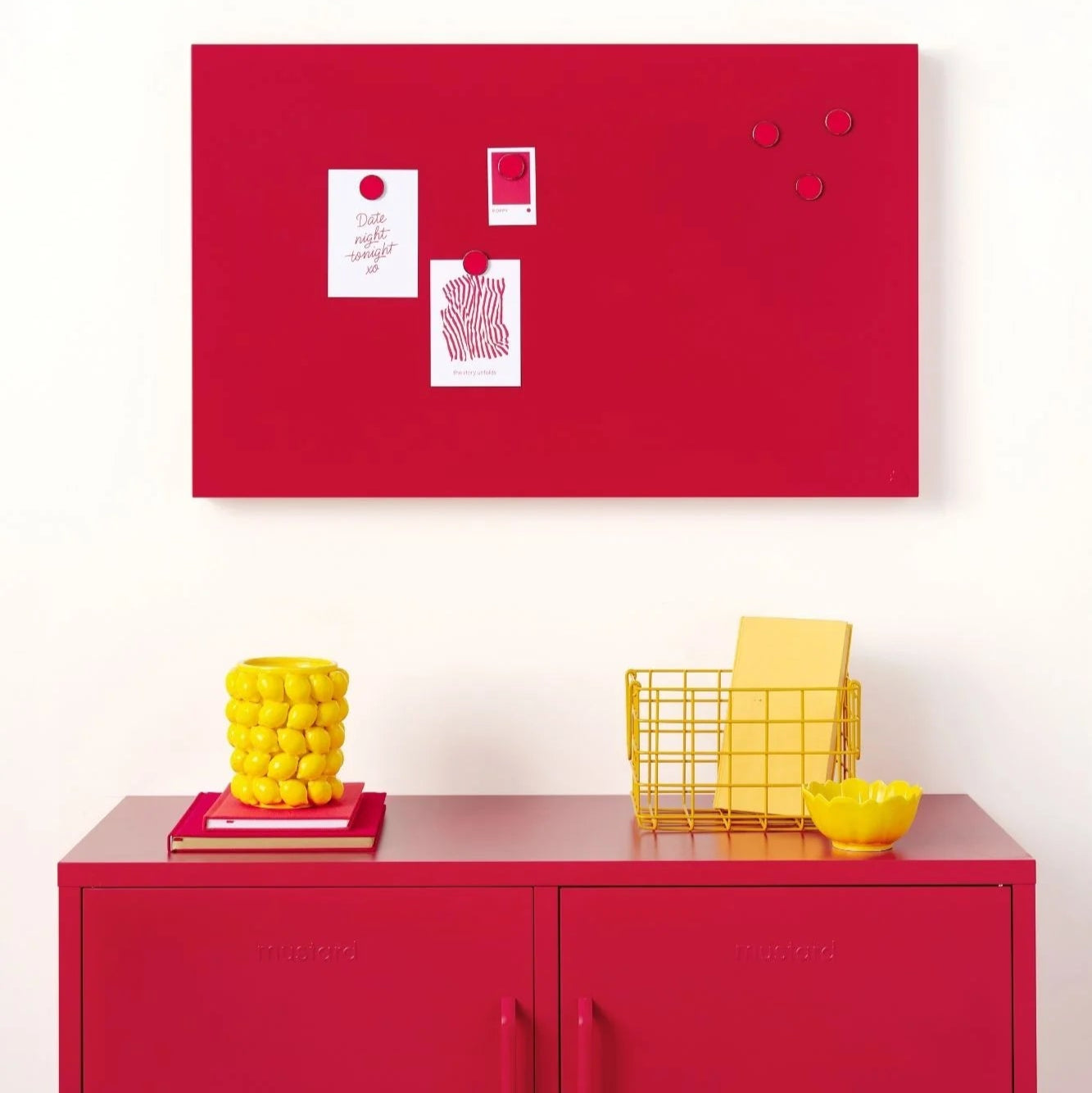 Red magnetic board above a red locker with yellow accessories on a white background