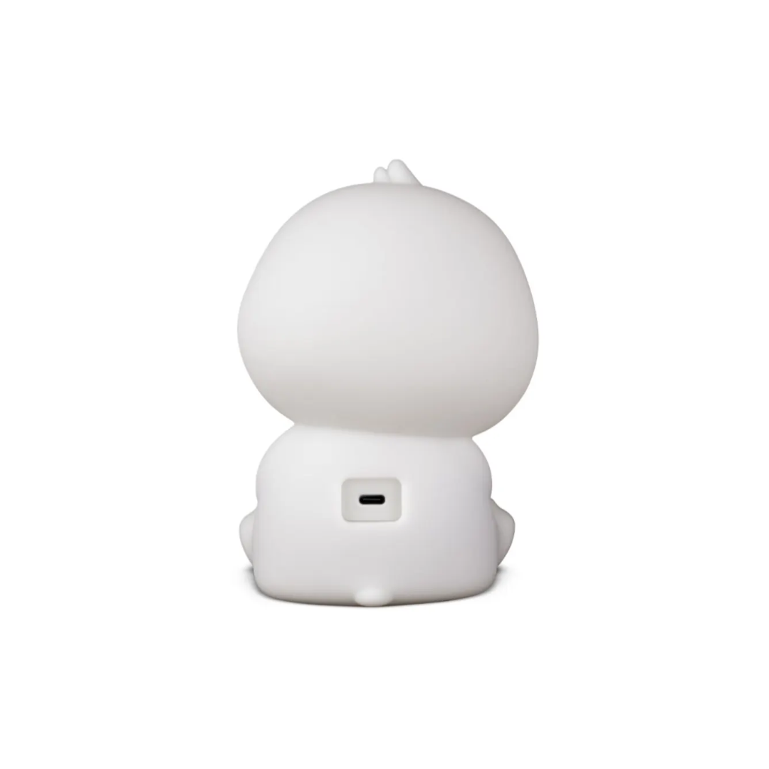 White night light shaped like a moon on a white background