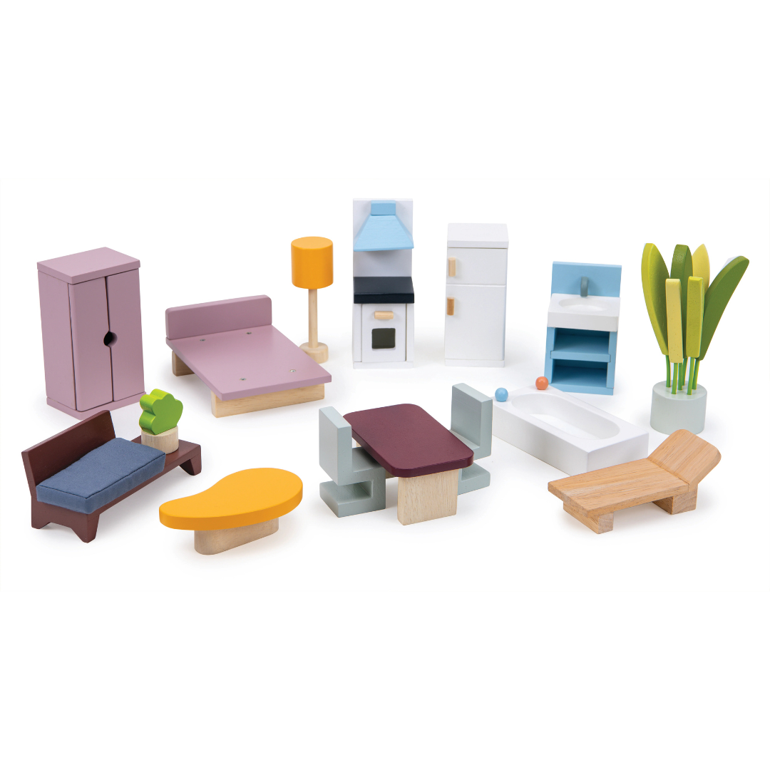 Set of miniature wooden furniture pieces on a white background