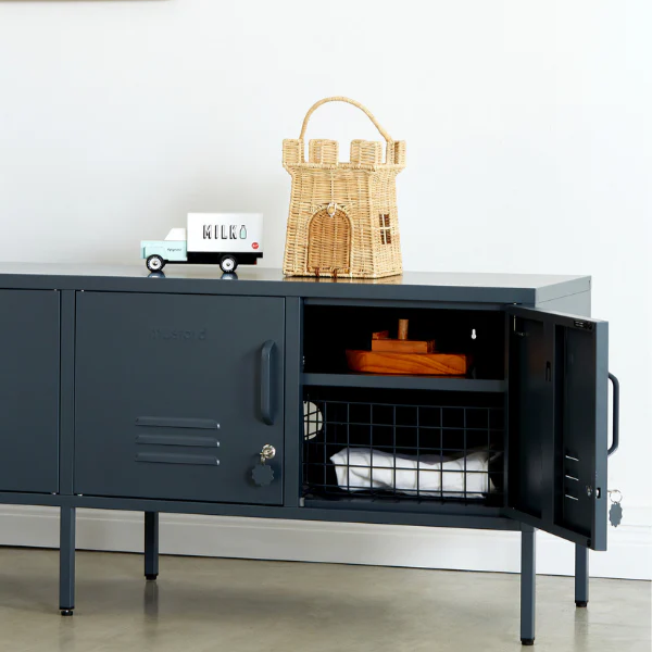 Gray locker-style cabinet with open door displaying items on a white wall background