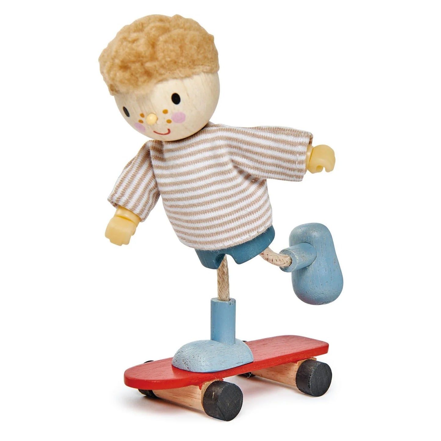 Toy figure of a child on a skateboard with a white background