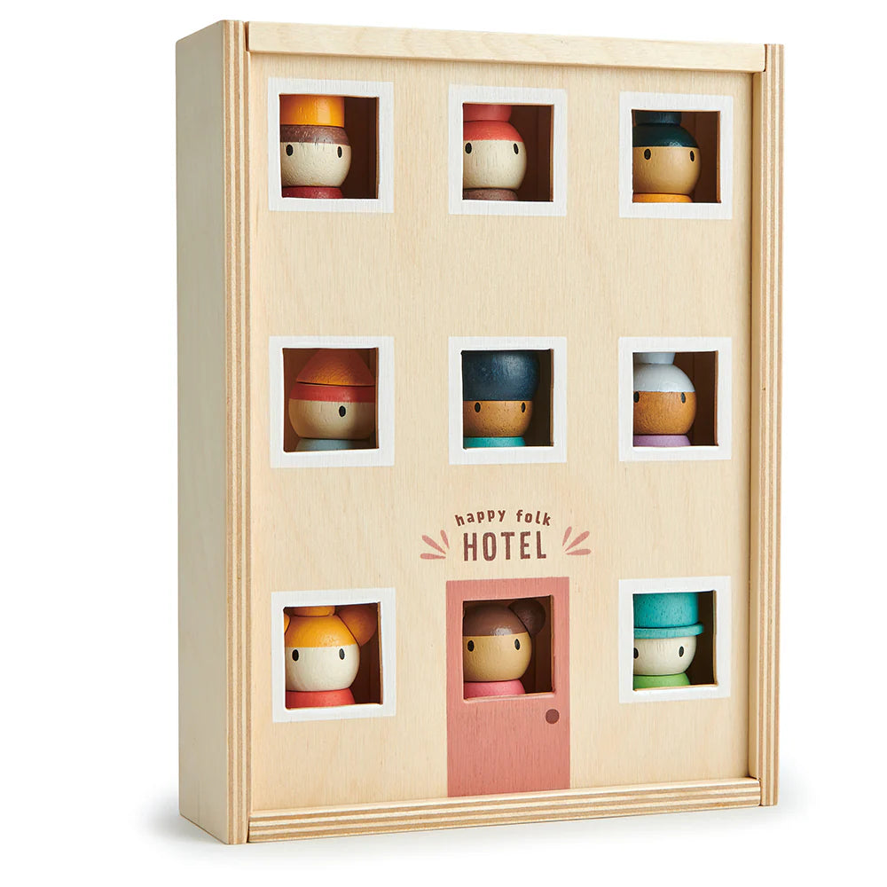 Wooden toy hotel with small figures inside each room on a white background