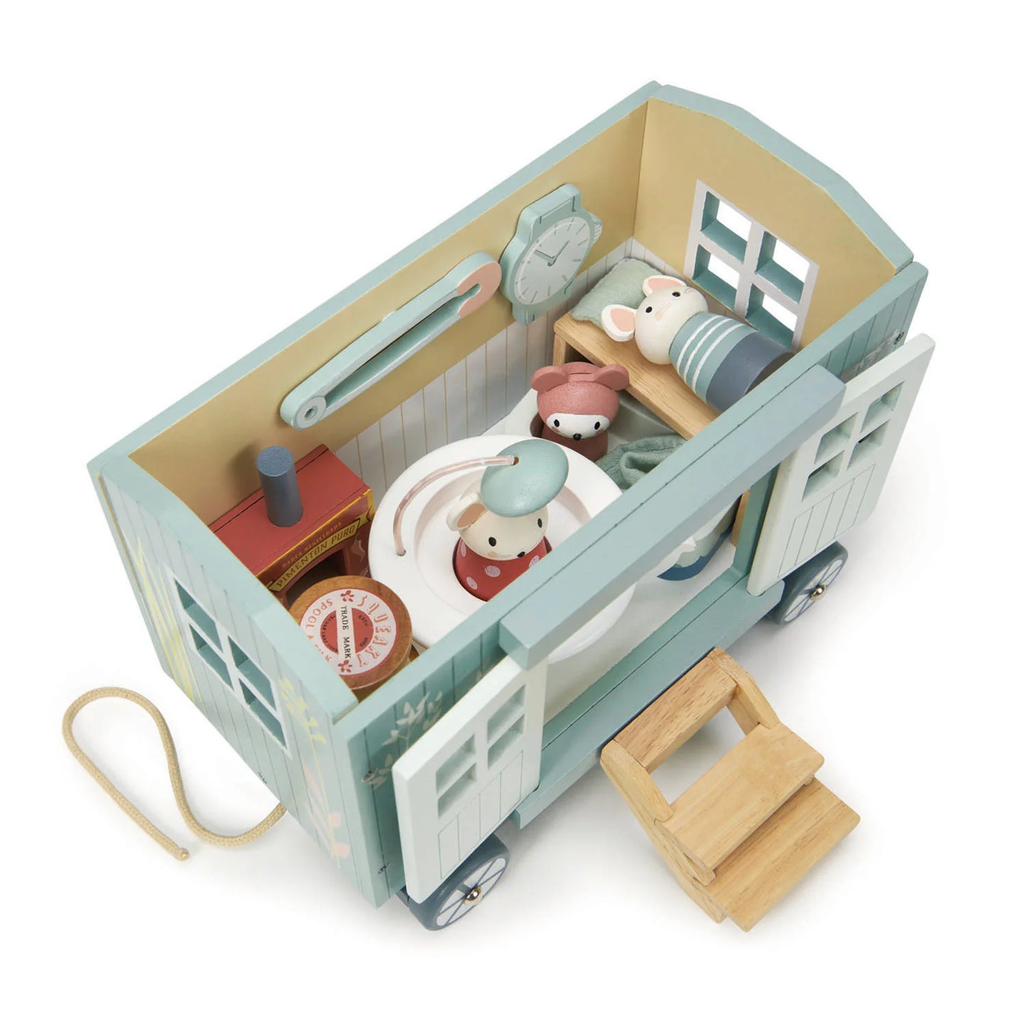 Toy train car with wooden furniture and teddy bears on a white background