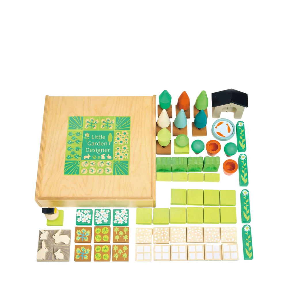 Wooden toy set with various pieces and a box labeled 'Little Garden Designer' on a white background.