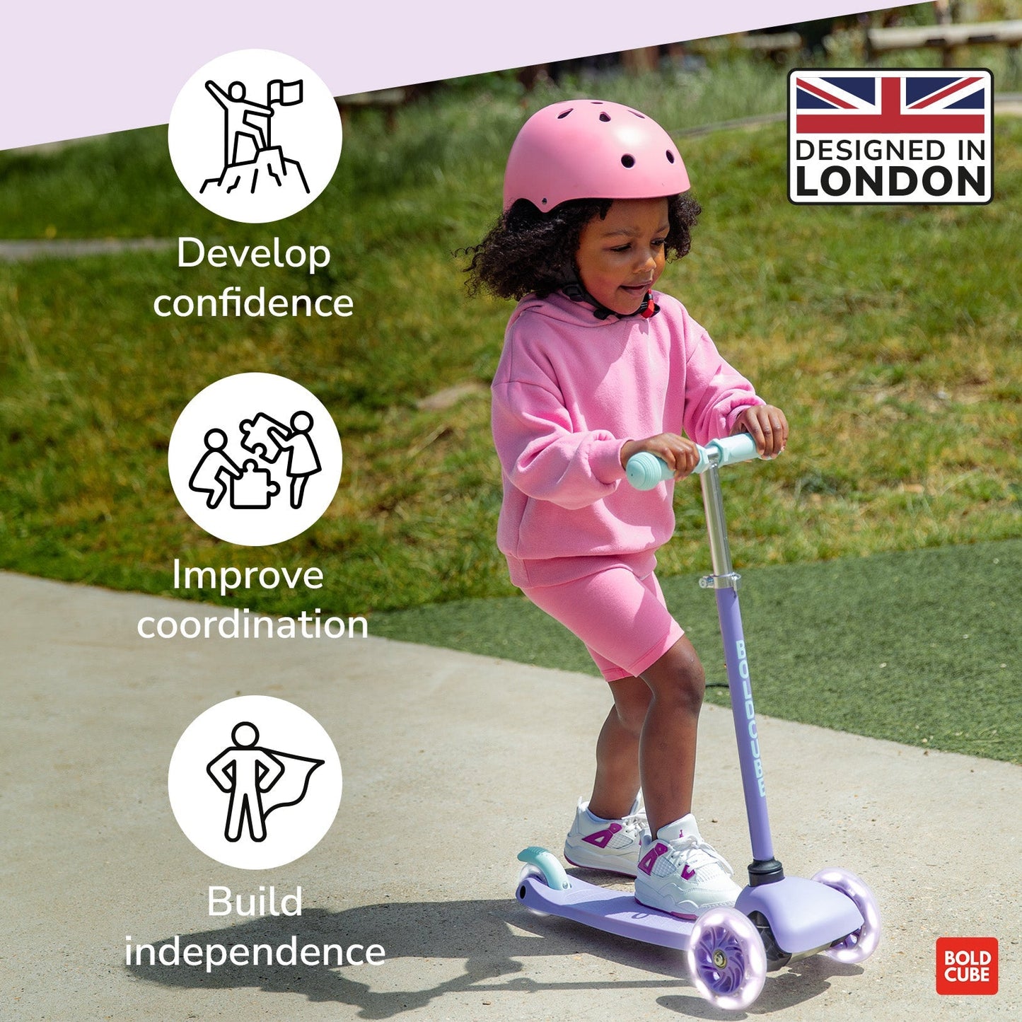 Child on a scooter with text about confidence, coordination, and independence, set against a grassy background.