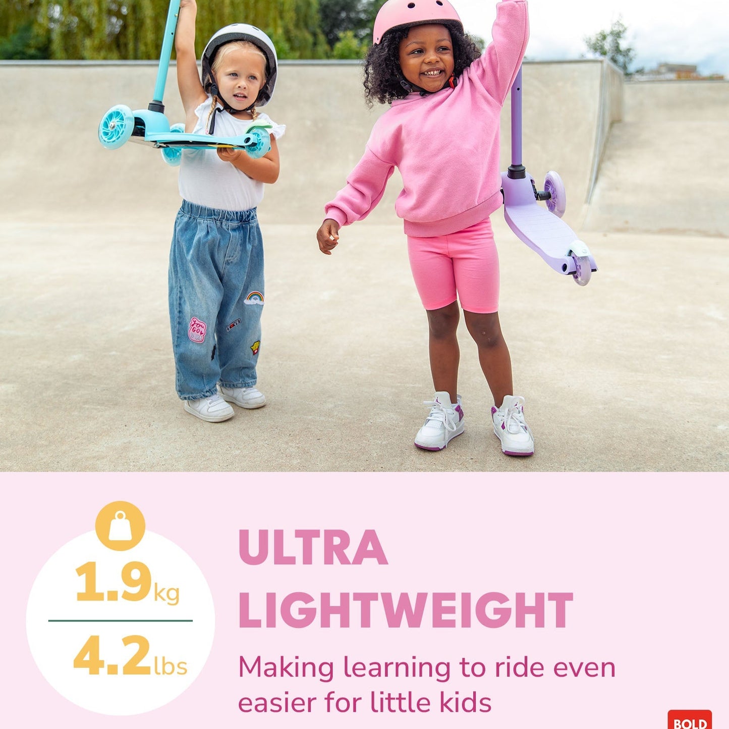 Two children with scooters on a concrete surface with a pink background and text about scooter weight.