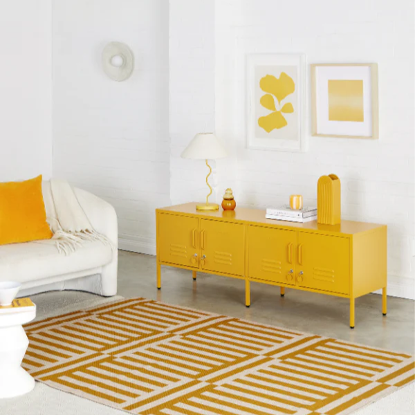 Modern living room with yellow furniture and decor