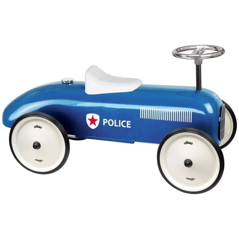 Blue police ride on toy car on white background