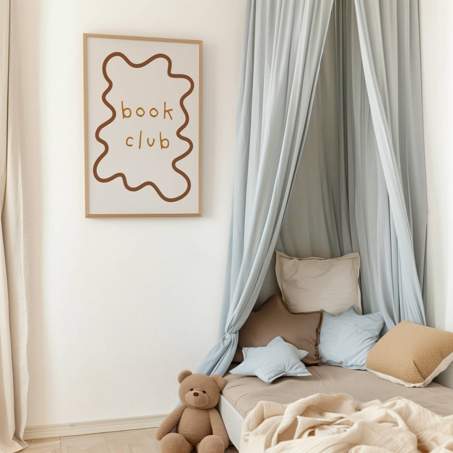 Children's reading nook with curtains, pillows, and a teddy bear.