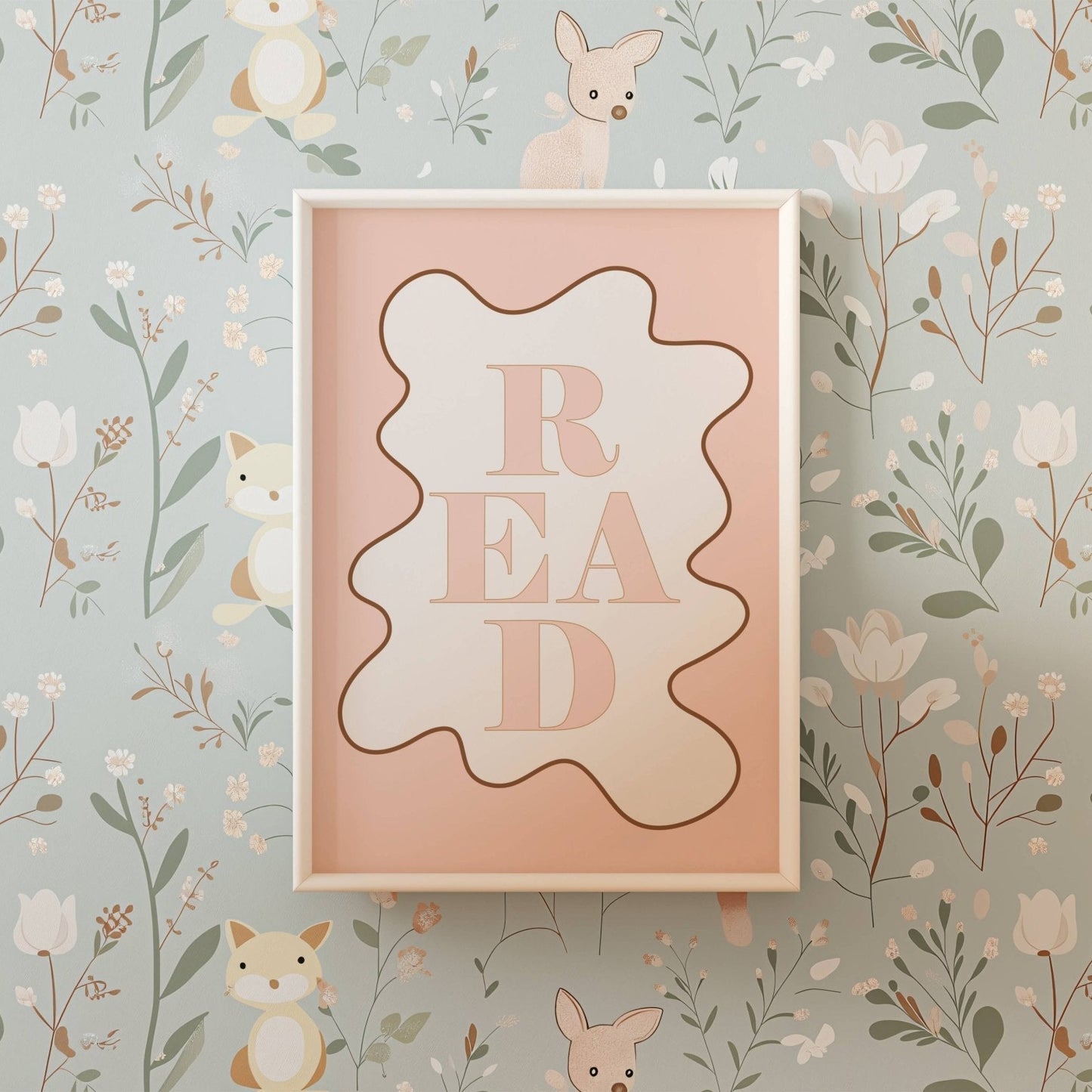 Framed pink sign with 'READ' on a floral and animal wallpaper background
