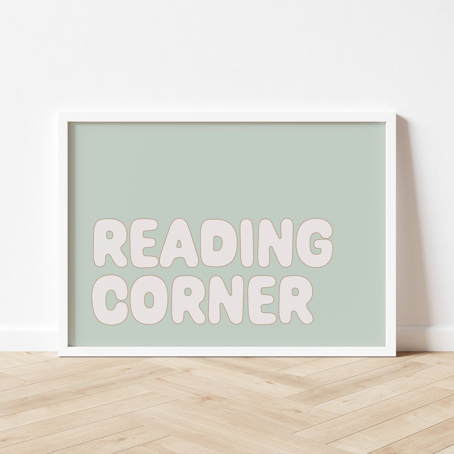 Framed poster with 'READING CORNER' text on a light green background