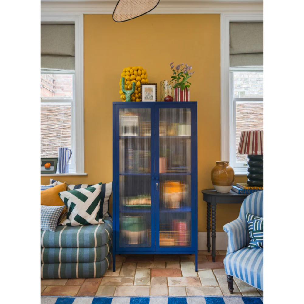 Blue cabinet in a living room environment