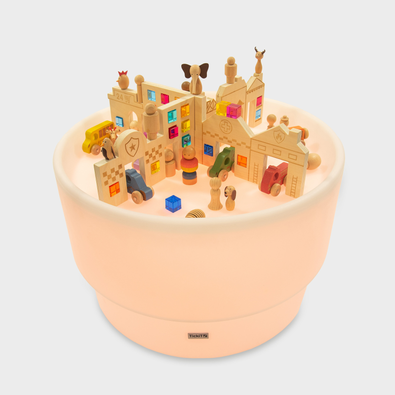 Toy building set on a sensory light table