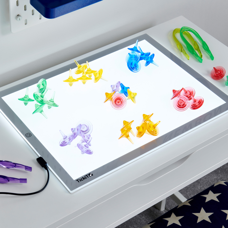 Light-up panel board with colourful shapes