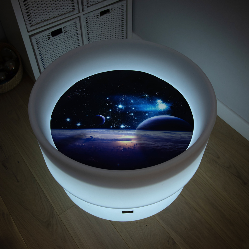 space mat on a discovery sensory table