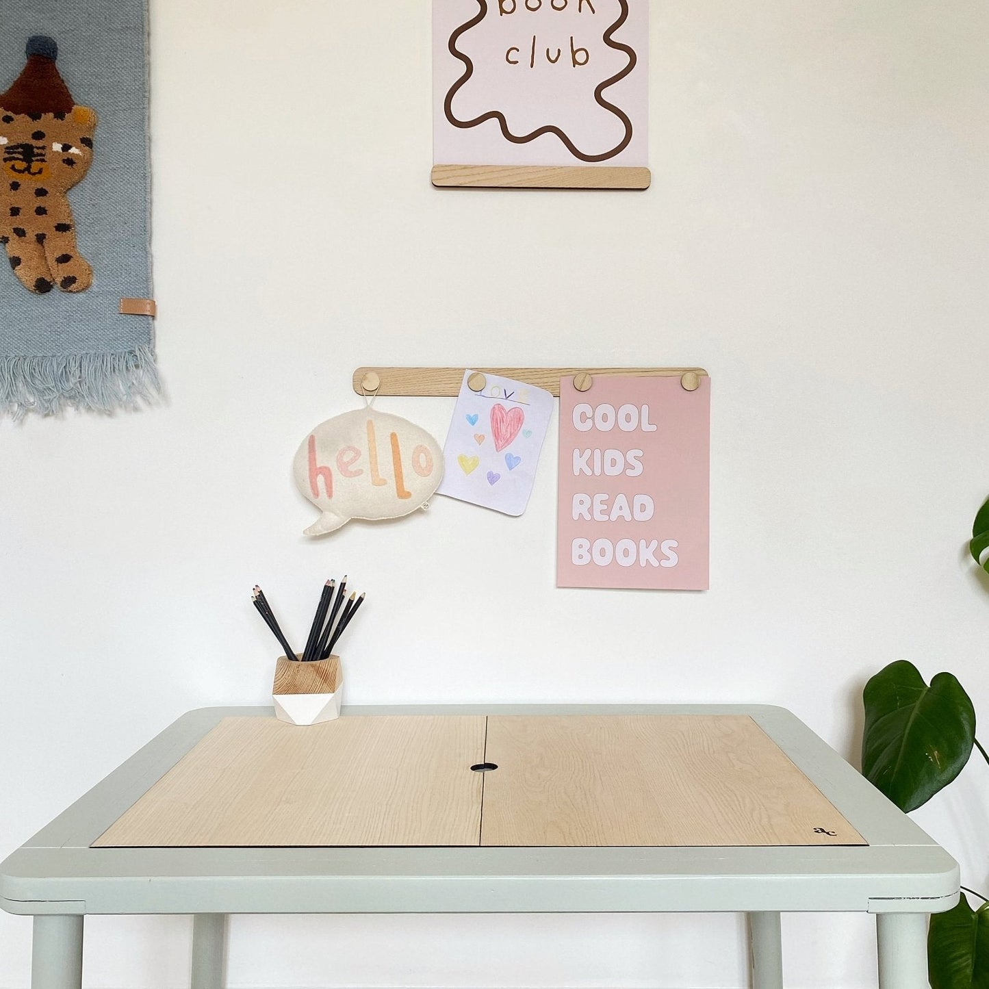 Children's desk with wall decorations in a room setting