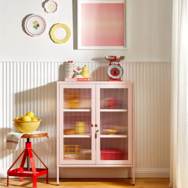 Pink blush cabinet in a home setting