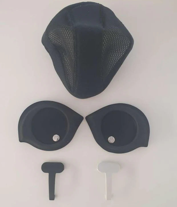 Set of black motorcycle helmet parts on a white background