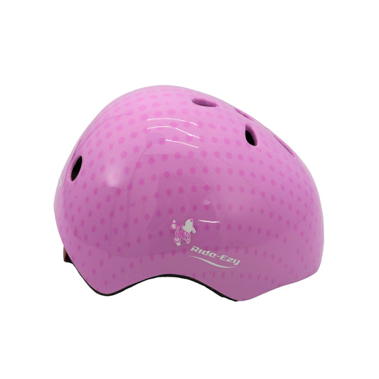 Pink helmet with a textured surface on a white background